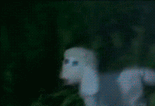 A sheep puppet dramatically tumbling down a hill during a storm.